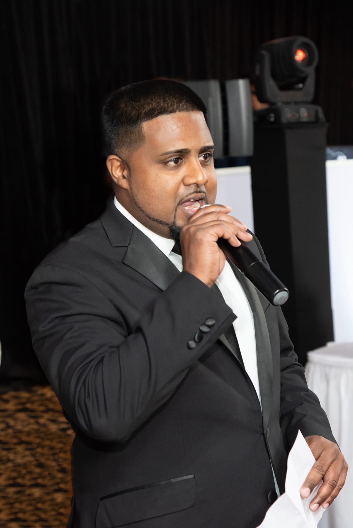 MC on the mic keeping the program moving